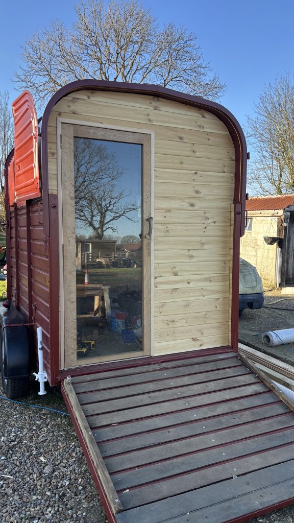 horsebox sauna build rear cladding and door installed